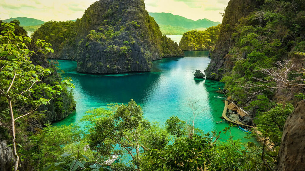 Kayangan Lake, Coron, Palawan. This place brought me into prayer. There's something spiritual in the beauty of nature. "Lake Kayangan is one of Coron’s primary attractions. Accessible by a steep 10-minute climb, the crystal-clear waters of Lake Kayangan are nestled into the mountain walls; underwater is like a moonscape. There’s a little wooden walkway and platform to stash your things if you go for a swim." (Lonely Planet) | Photo by Bro. Jeffrey Pioquinto, SJ licensed under CC BY 2.0.